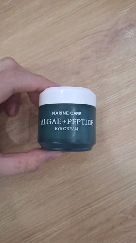 HEIMISH Marine Care Eye Cream texture closeup shows creamy, nourishing formula.
