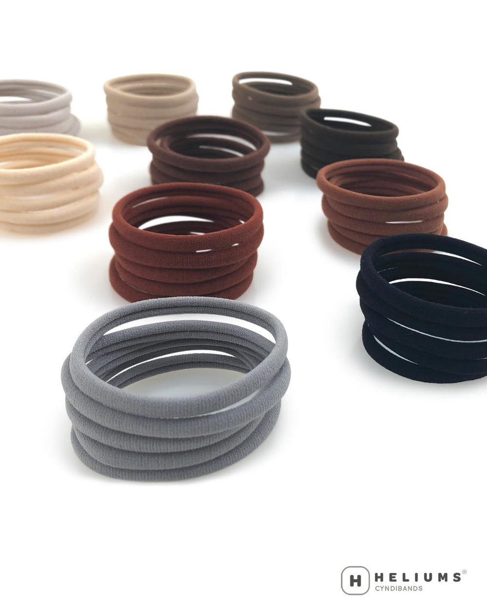 Heliums compact packaging keeps sets organized for travel and on-the-go styling.