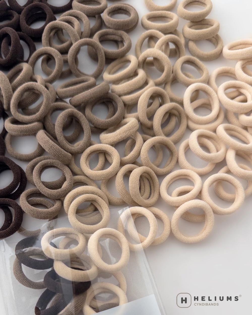 Heliums extra-small size ideal for delicate styles like fine braids.