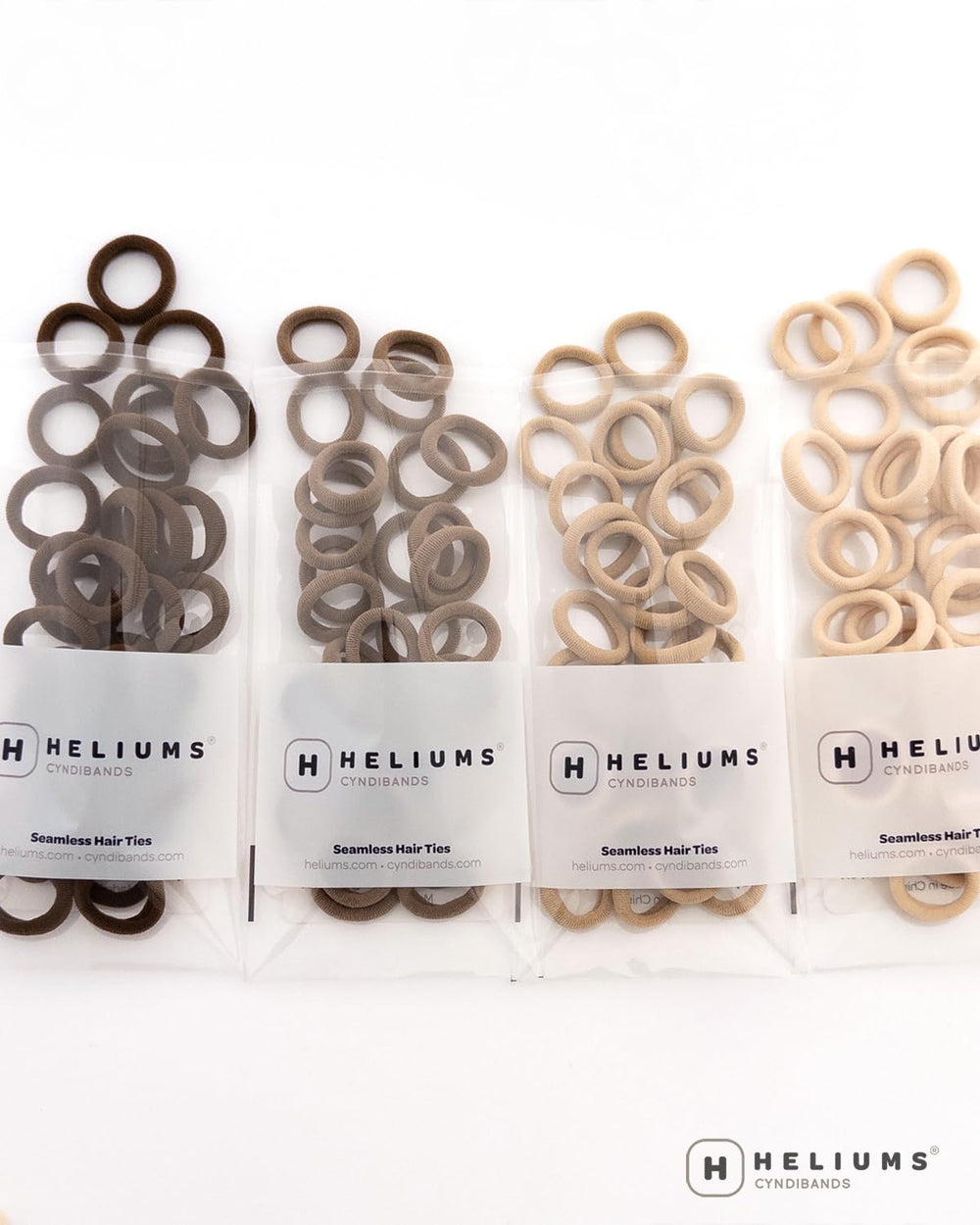Heliums light ash brown shade blends discreetly with hair for subtle look.