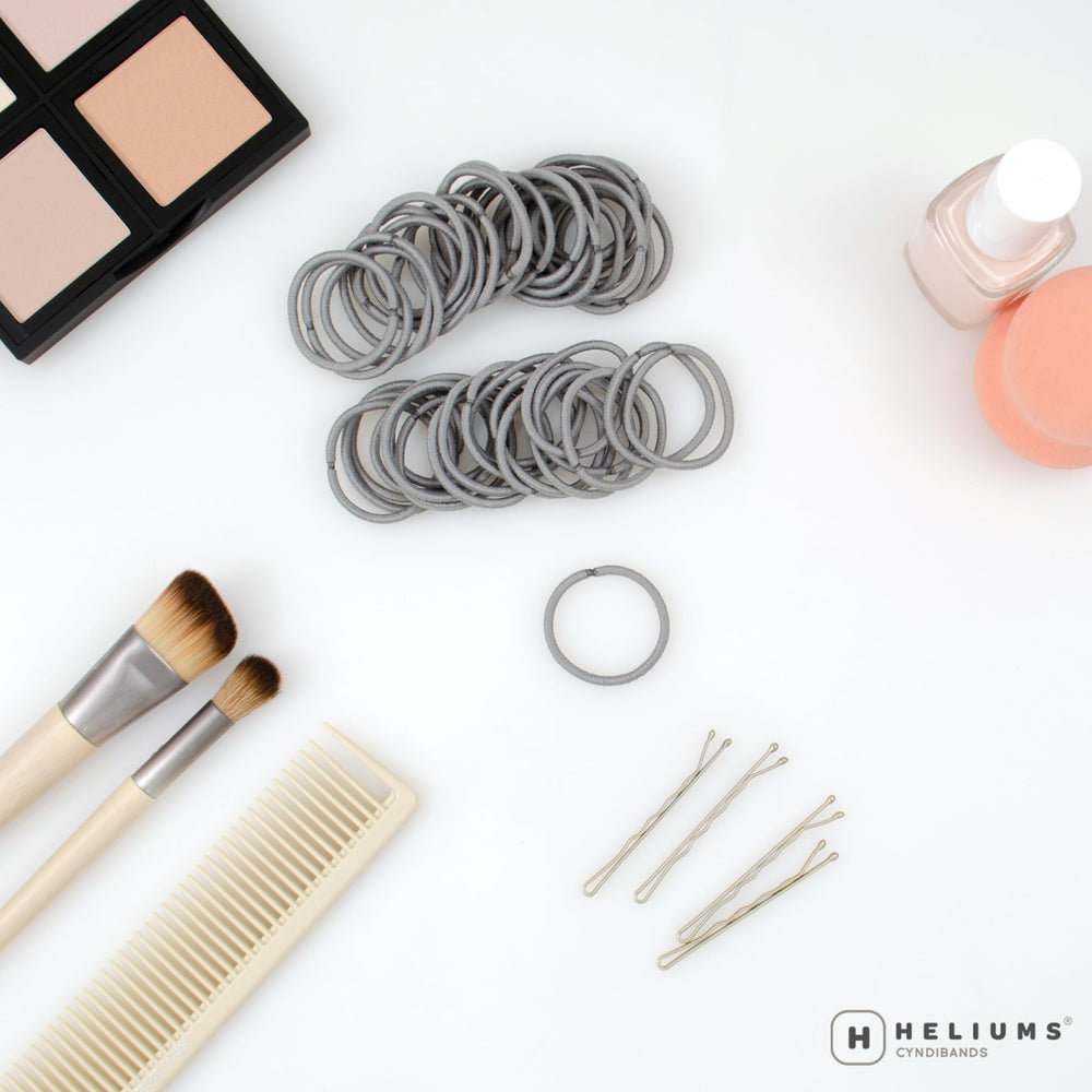 Heliums gray mini-elastics close-up showing fabric-covered, snag-free design.