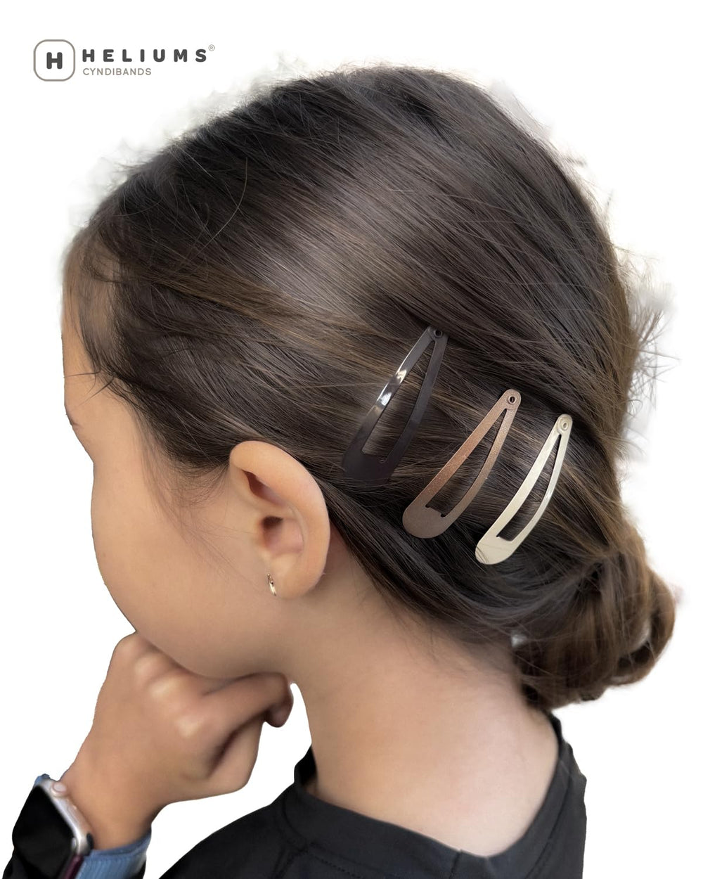 Heliums Snap Hair Clips metal finish adds subtle shine to hairstyle.
