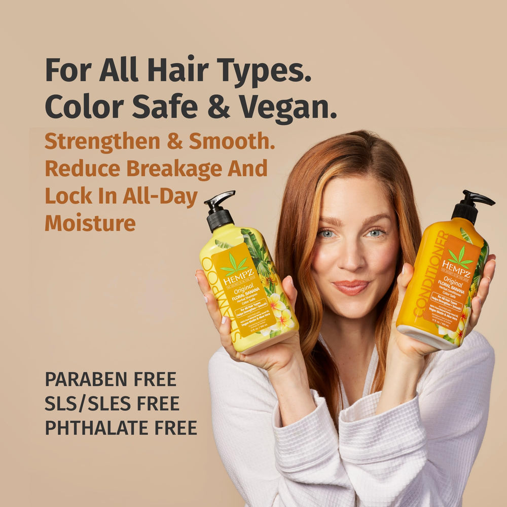 Hempz shampoo bottle on sink conveys refreshing cleanse for dry, color-treated hair.
