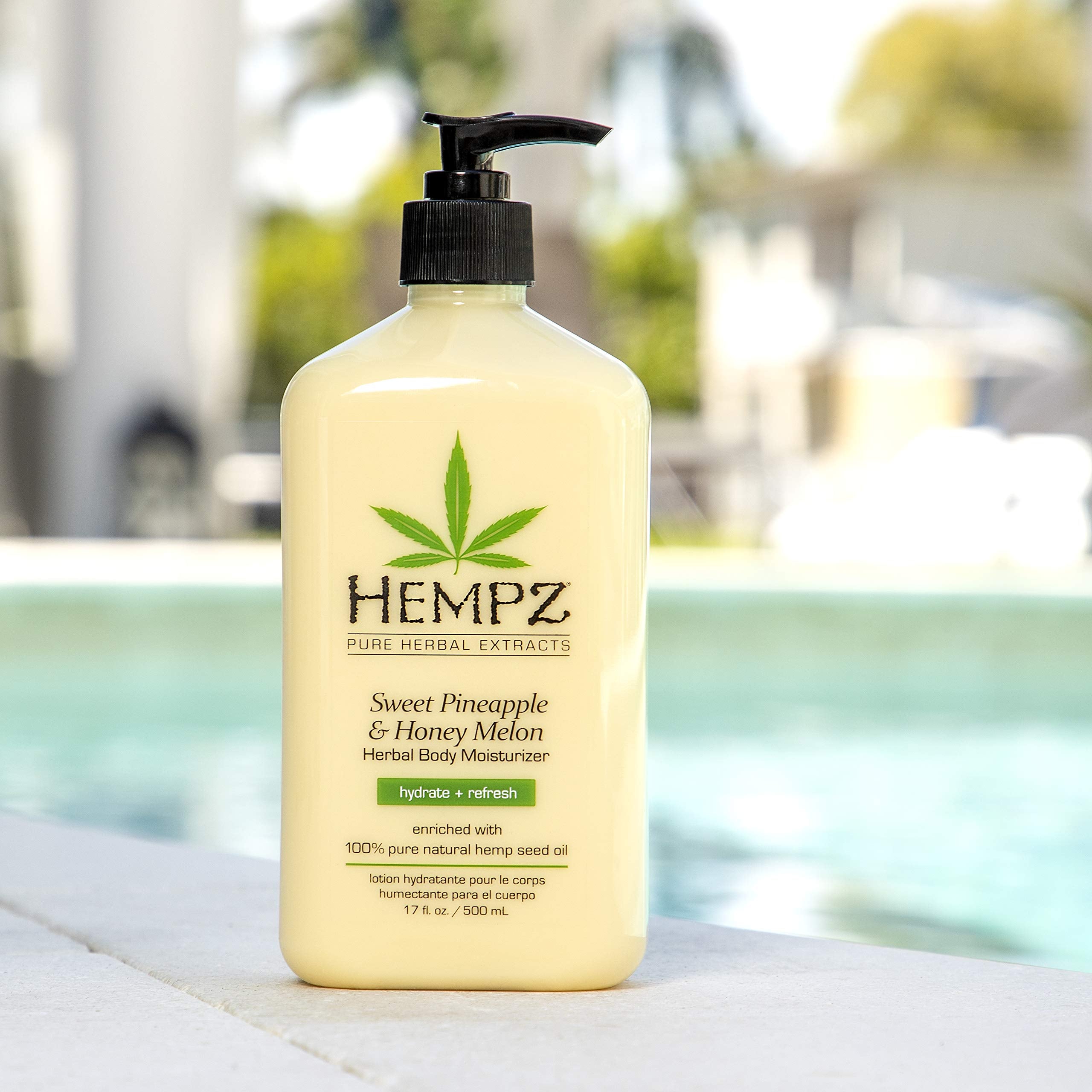 Hempz Sweet Pineapple & Honey Melon lotion application on hand demonstrates skin hydration
