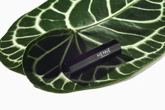 Henné Organics lip balm handcrafted at the Wilmington, NC HQ.