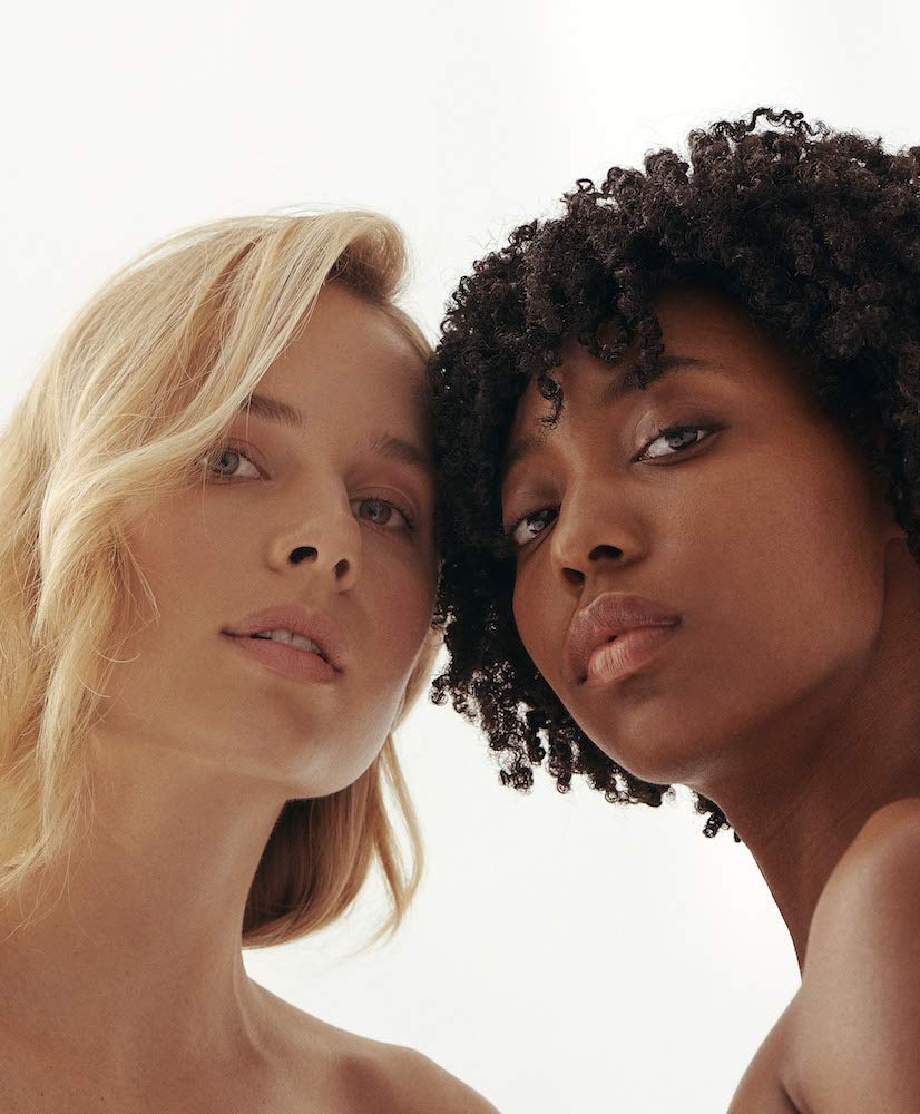 Henné Organics cruelty-free logo underscores ethical, animal-friendly cosmetics.