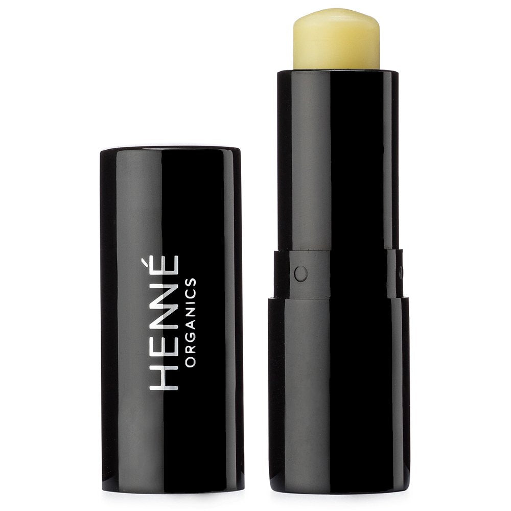 Henné Organics Luxury Lip Balm V2 in a sleek black tube for daily moisture.