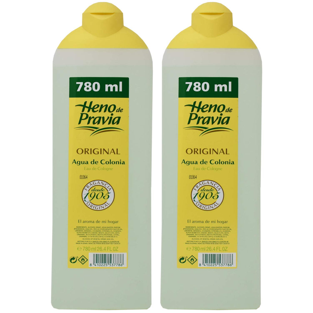 Heno de Pravia Original Agua de Colonia bottle pour showing fresh citrus aroma for daily refresh.