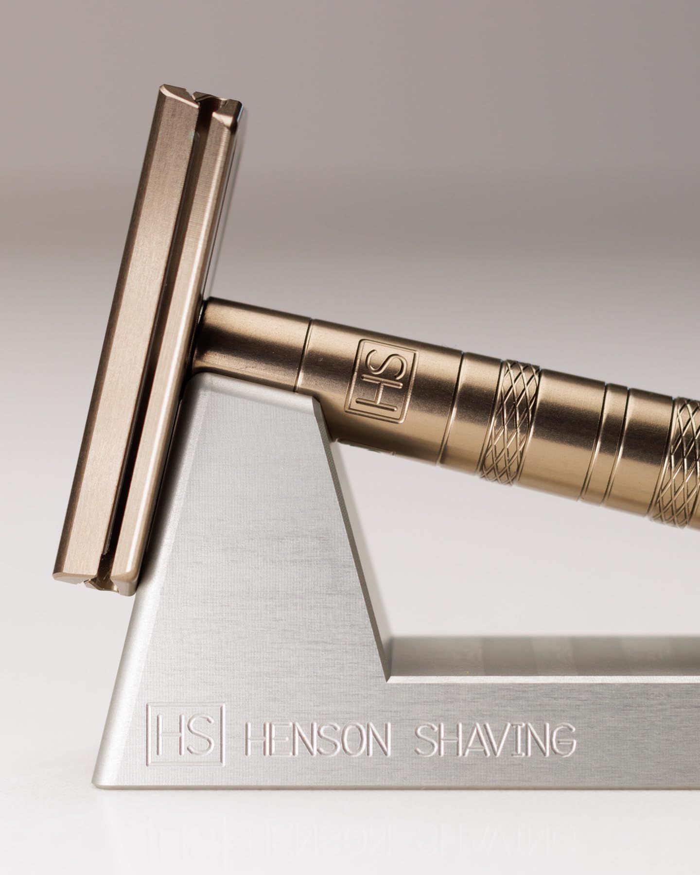Henson Razor Stand measurement view illustrating 1.38 inch height and 3.74 inch length