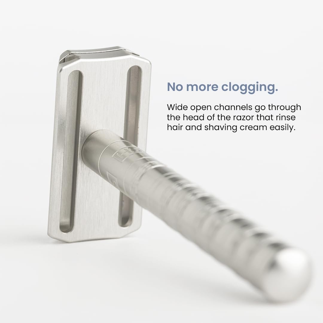 Henson Shaving Razor wide-open channels for easy cream and hair rinse.
