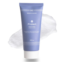 Henson Shaving travel-size shave cream bottle ready for on-the-go grooming