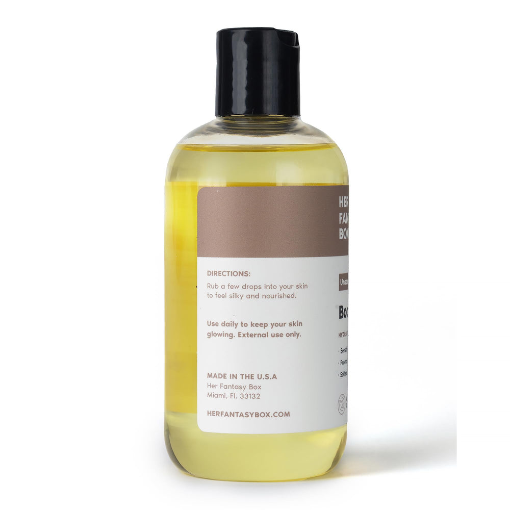 Her Fantasy Box body-splash spread-on-skin depicts even, hydrated skin after application.