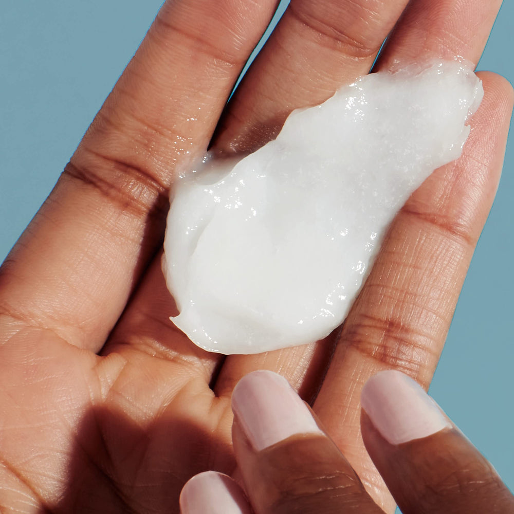 Herbal Essences bio:renew dermatologist-tested seal on product image.