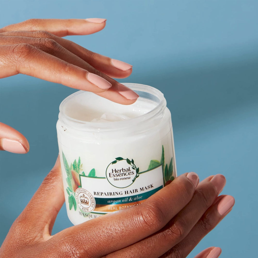 Herbal Essences bio:renew recycled-plastic packaging graphic for sustainable care.
