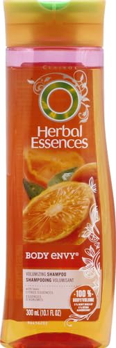 Herbal Essences Body Envy bottle in hand ready for daily cleansing