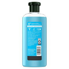 Herbal Essences Hello Hydration conditioner pour action showing easy distribution and moisturizing impact.