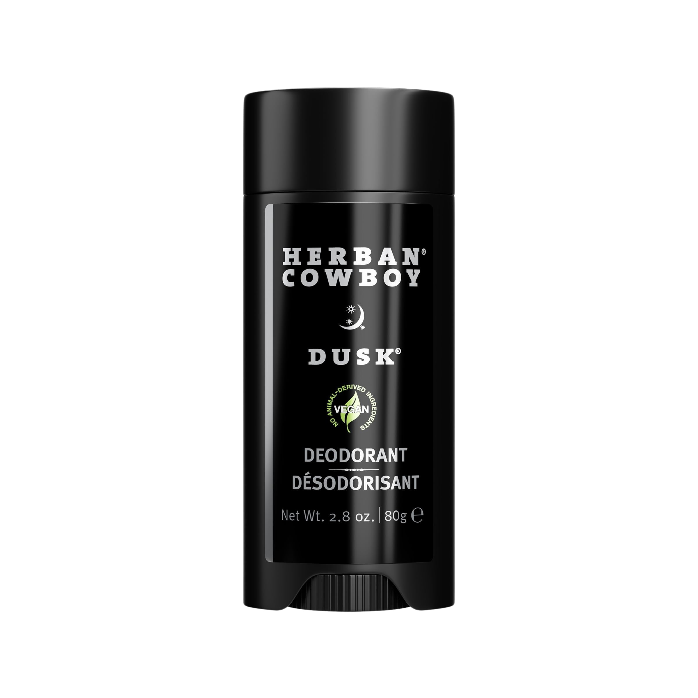 Herban Cowboy Dusk aloe-infused deodorant stick in hand, offering aluminum-free daily freshness.