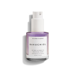 HERBIVORE Bakuchiol Serum bottle on a clean vanity for smoothing skin texture.