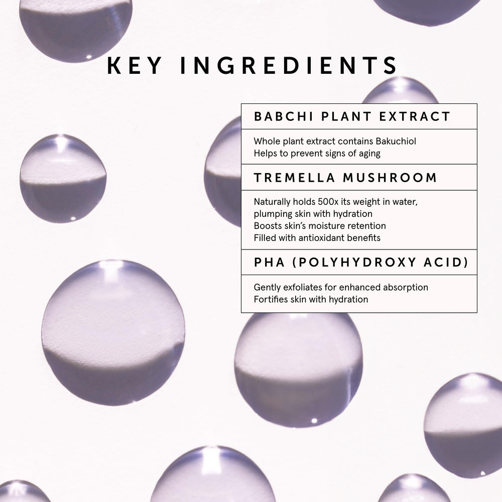 Gua sha tool beside HERBIVORE serum bottle to highlight routine glow.