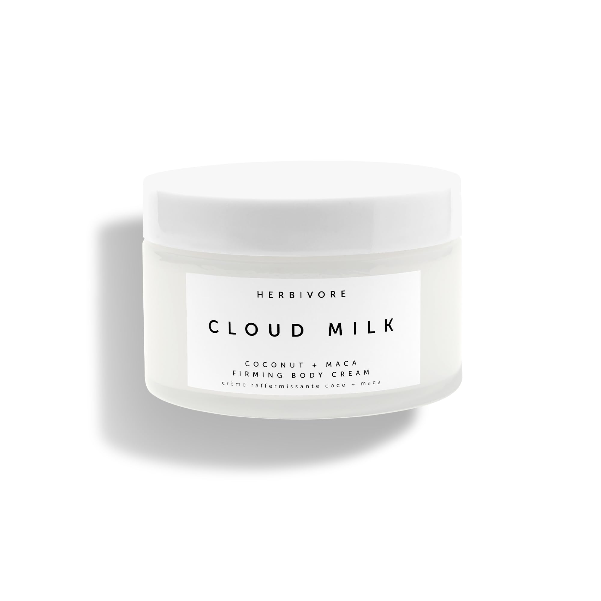 HERBIVORE Cloud Milk bottle close-up showcasing sleek packaging and quick absorption.