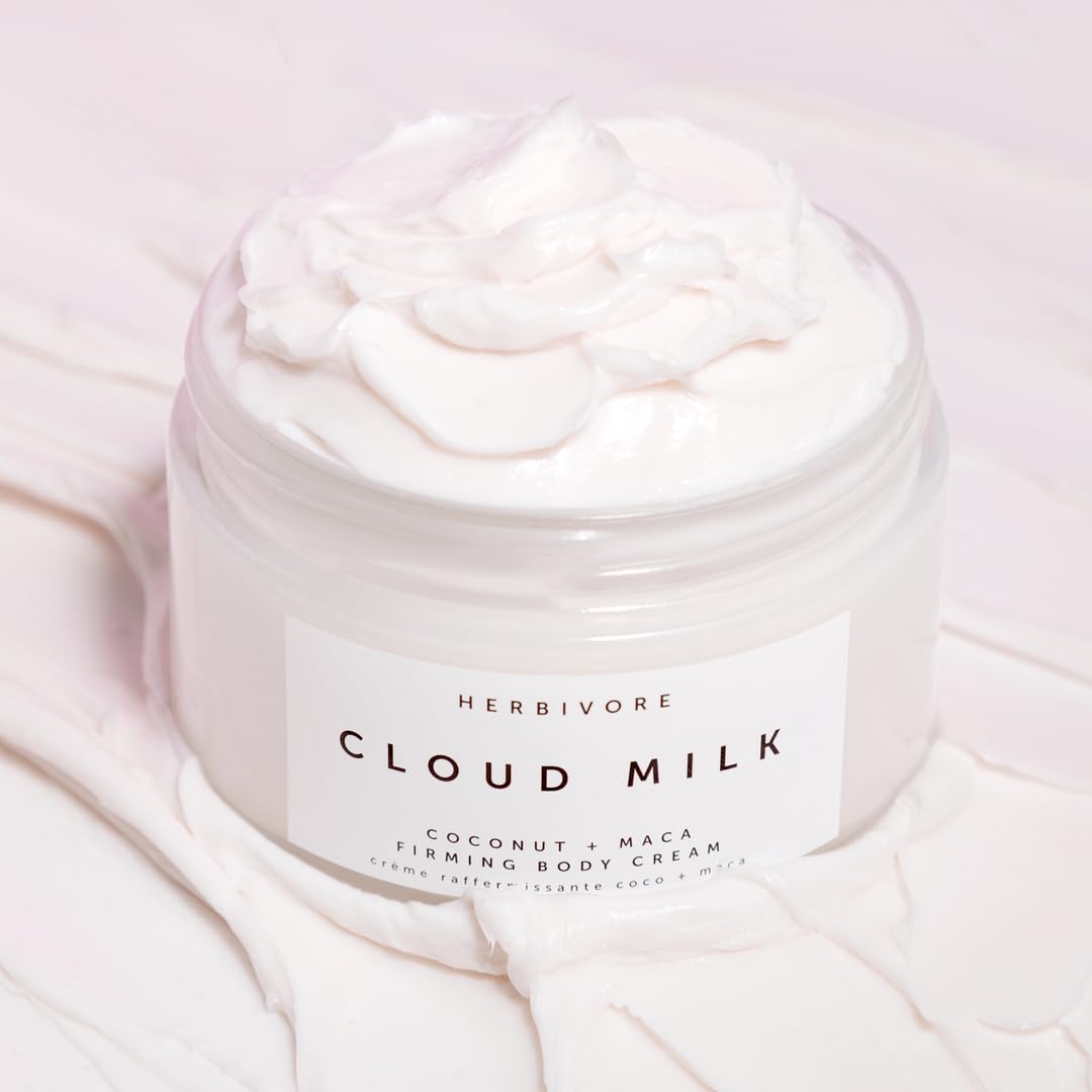 HERBIVORE Cloud Milk packaging on bathroom shelf reinforces premium vegan skincare.