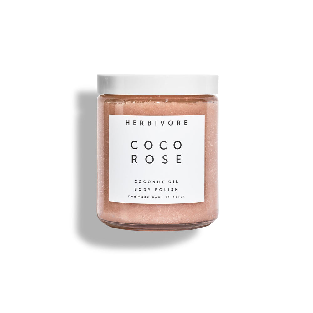 HERBIVORE Coco Rose body polish jar close-up shows creamy exfoliation for smoother skin
