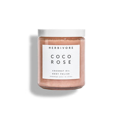 HERBIVORE Coco Rose body polish jar close-up shows creamy exfoliation for smoother skin