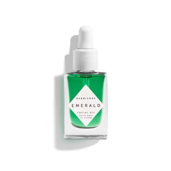 HERBIVORE Emerald Facial Oil bottle for calming, hydrating daily skincare.