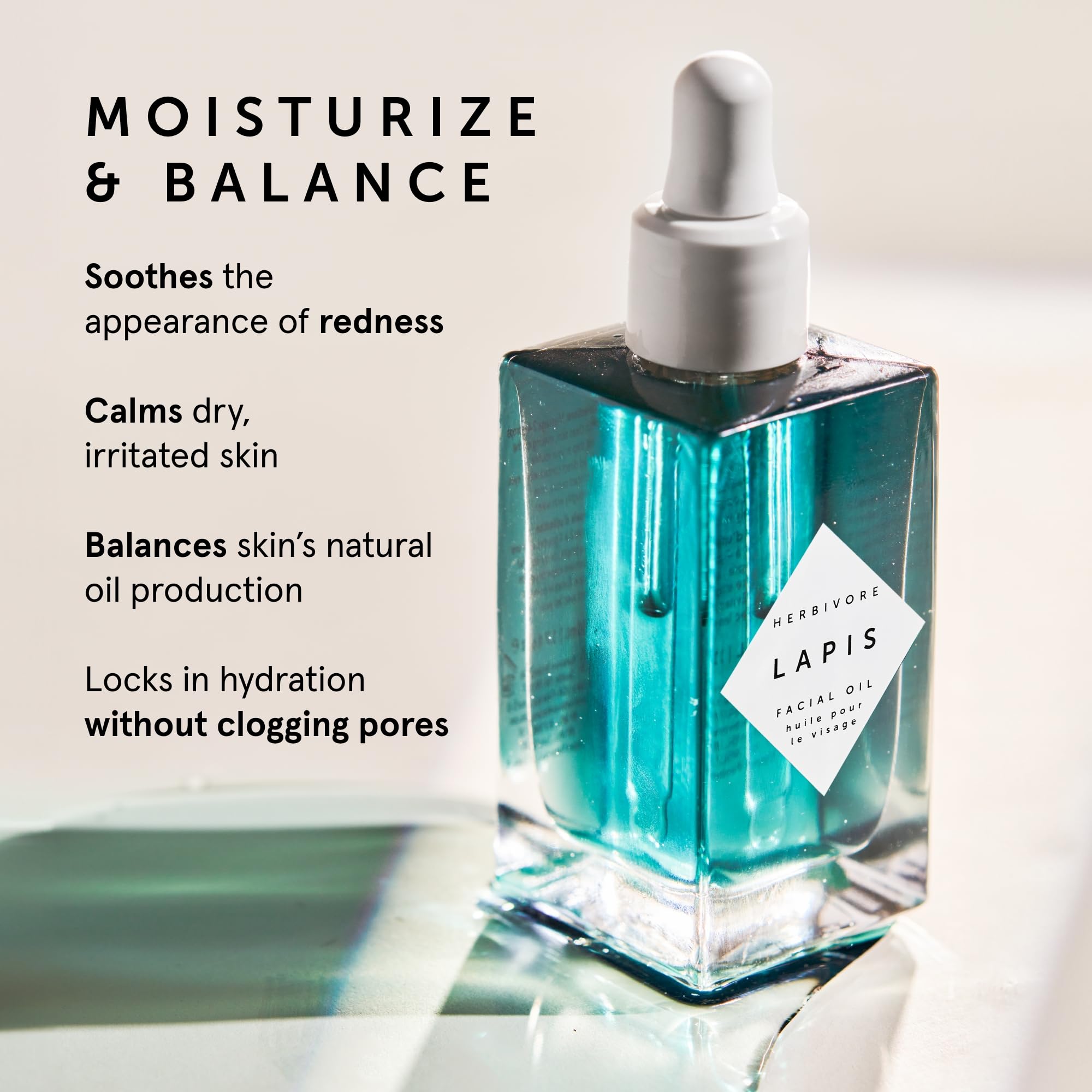 HERBIVORE Lapis Oil label closeup highlights Azulene rich calming properties.