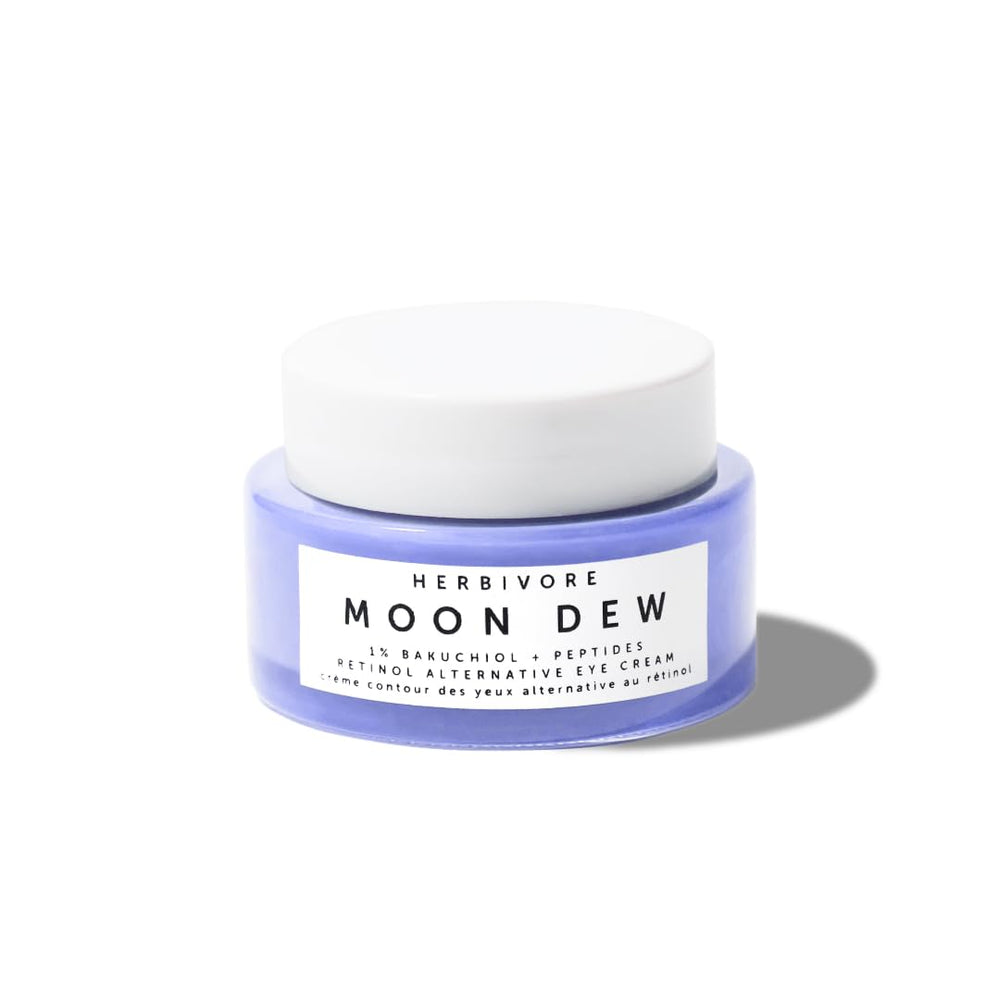 Herbivore Moon Dew eye cream demonstration hinting at quick absorption and use.