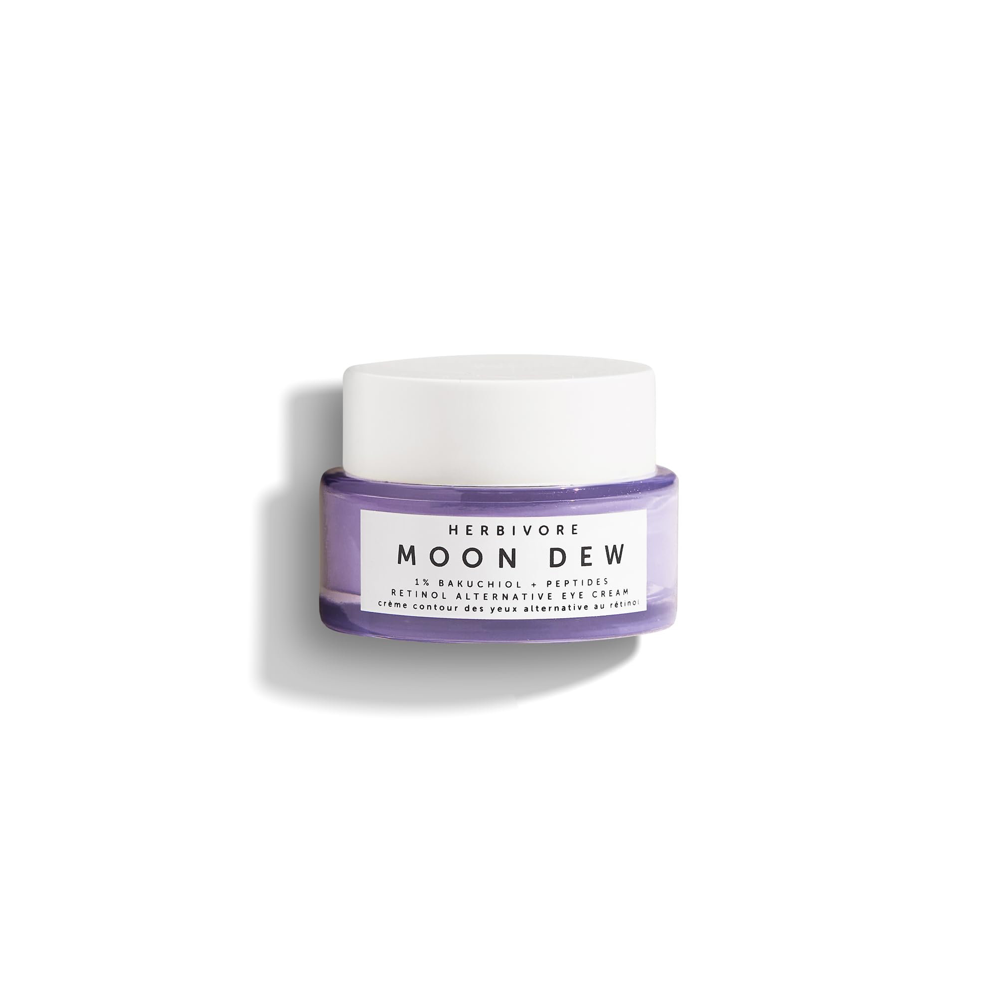 Herbivore Moon Dew eye cream jar close-up showing silky texture for daily eye care.