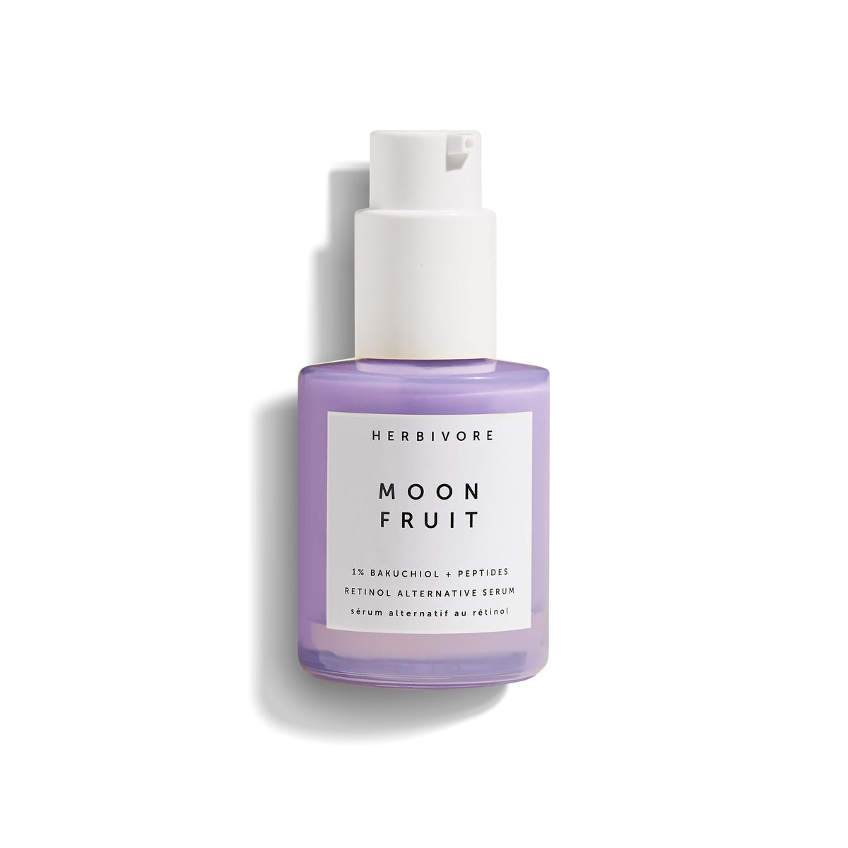 HERBIVORE Moon Fruit Serum bottle close-up showing smooth, radiant-skin potential