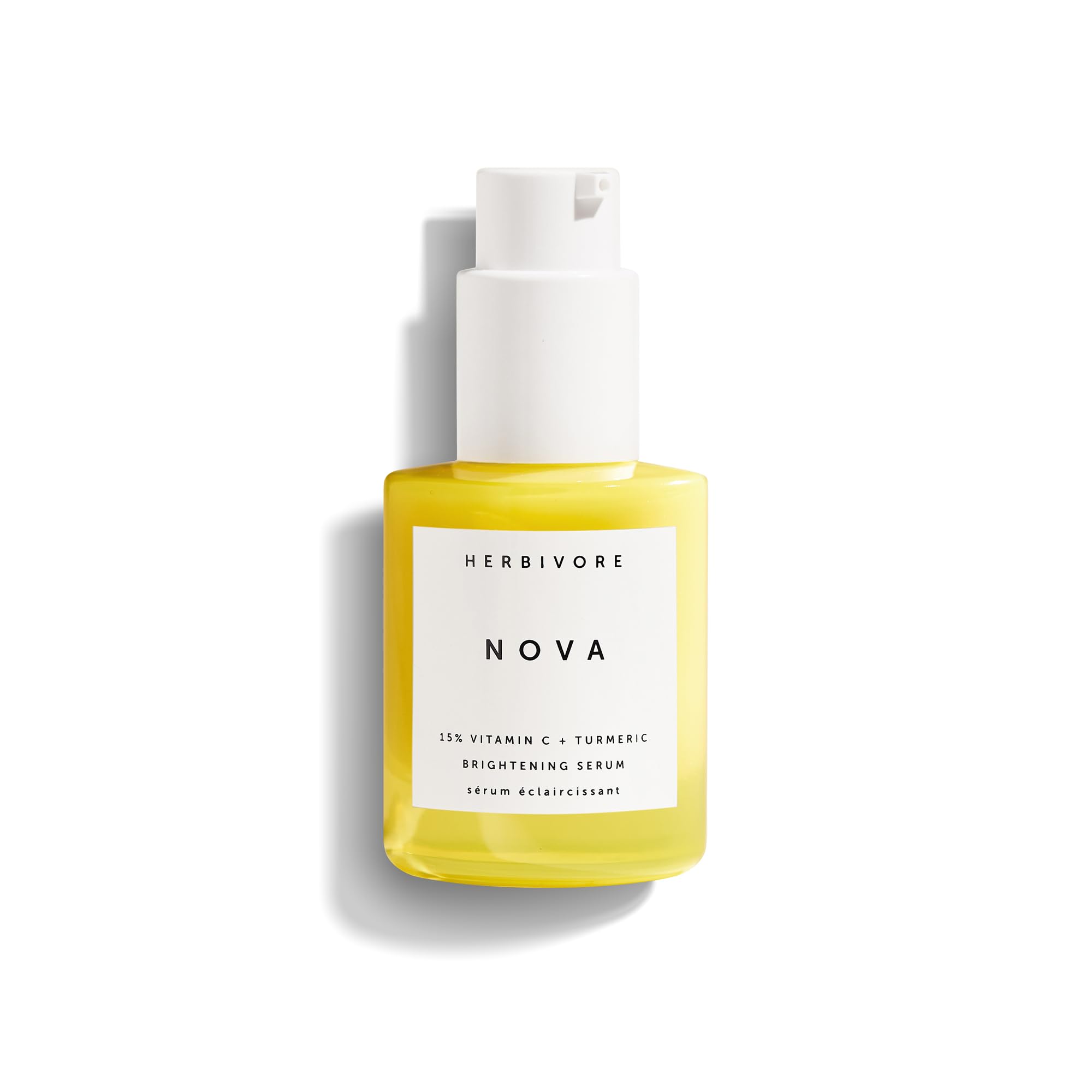 HERBIVORE Nova serum bottle closeup showing oil-soluble vitamin C for brightening
