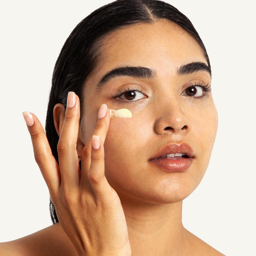 HERBIVORE Super Nova eye cream tube dispense demonstrates easy pea-sized application
