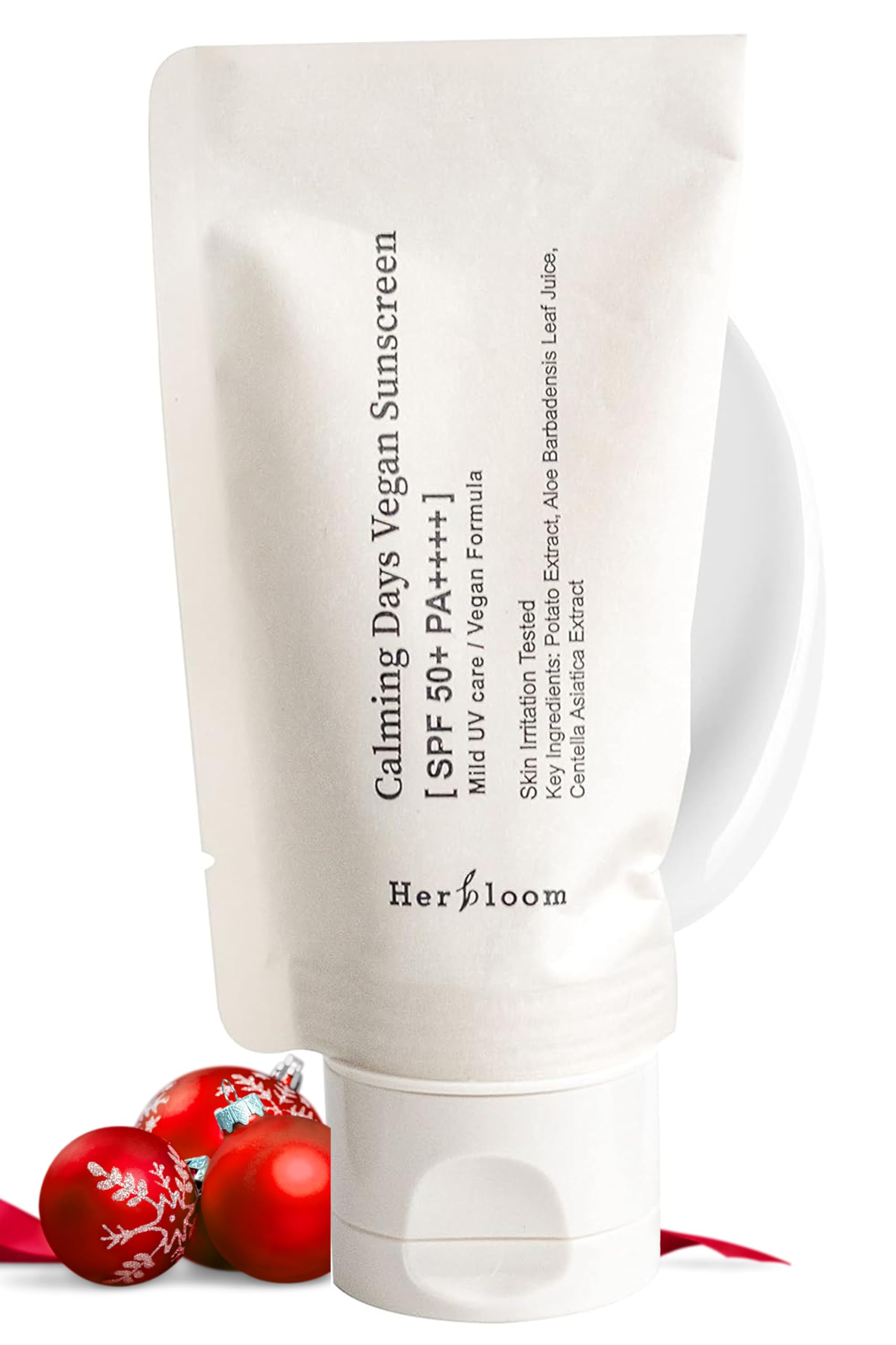 Herbloom Calming Days sunscreen bottle provides lightweight, non-greasy hydration for sensitive or dry skin.