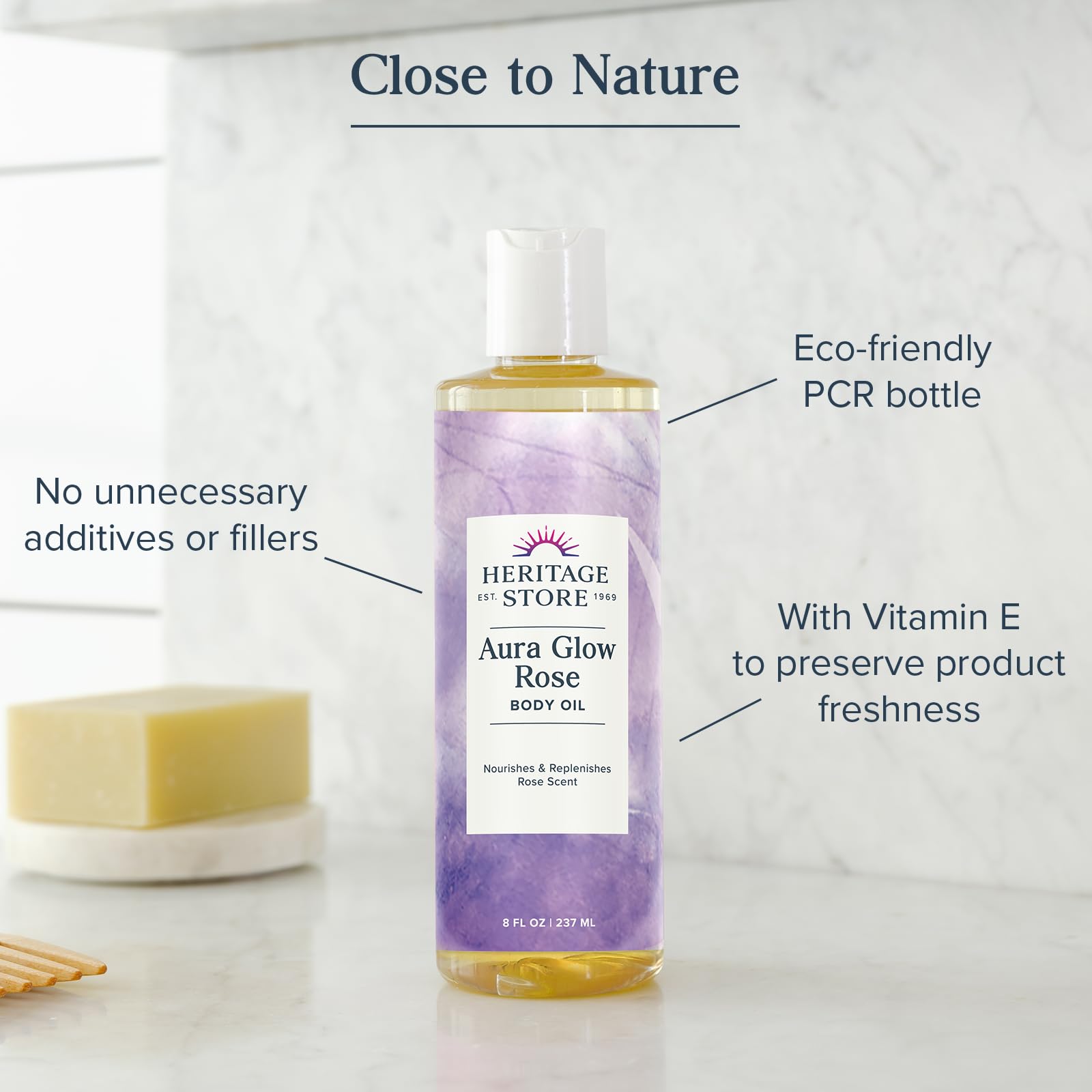 HERITAGE STORE Aura Glow Rose Body Oil on elbows and heels for dry-skin relief