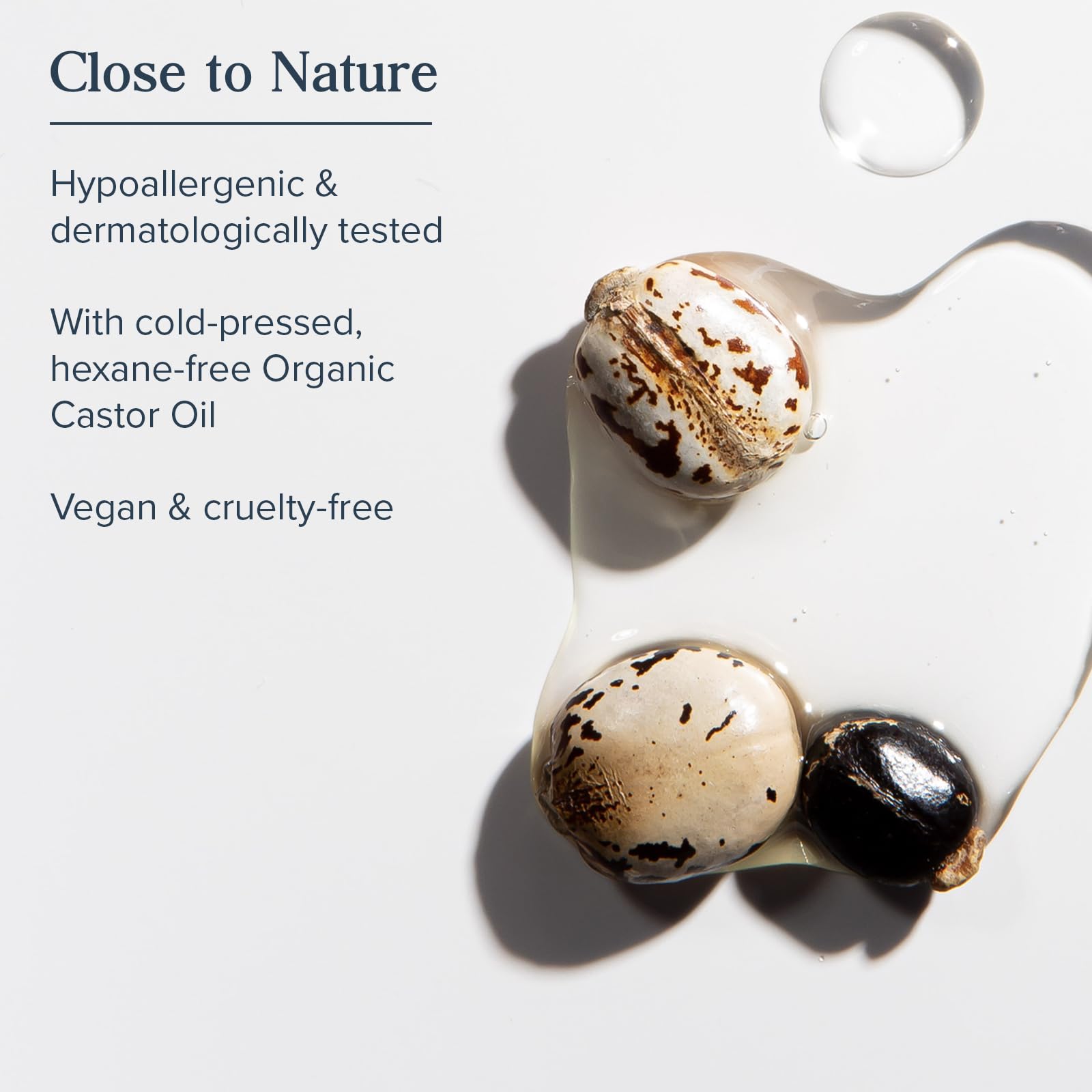Heritage Store ingredients closeup highlights organic castor oil and rosemary for healthy follicles