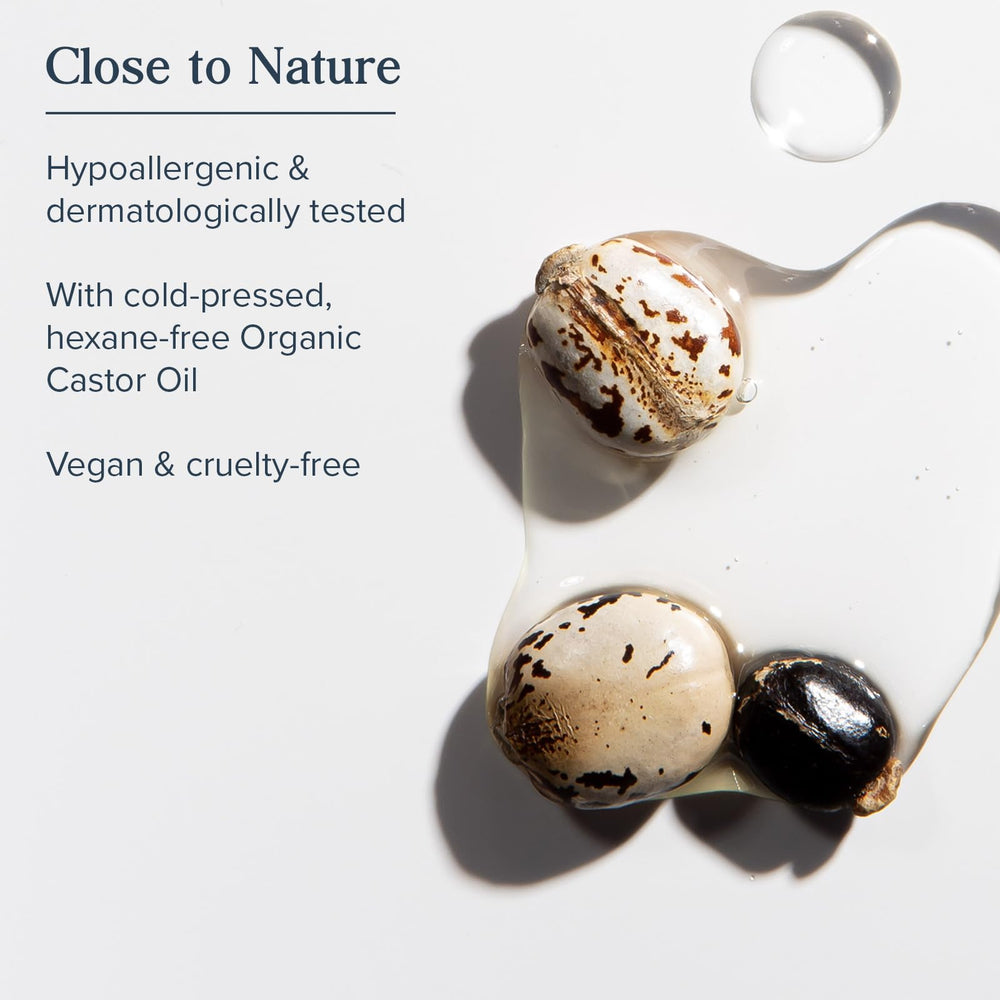Heritage Store ingredients closeup highlights organic castor oil and rosemary for healthy follicles