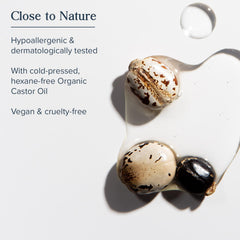 Heritage Store ingredients closeup highlights organic castor oil and rosemary for healthy follicles
