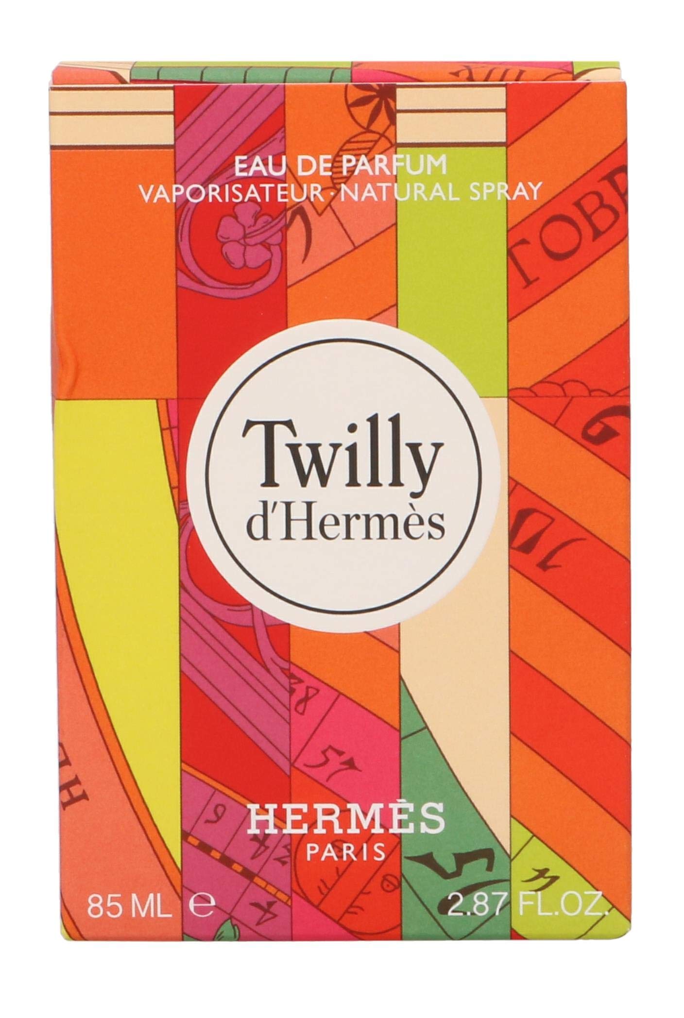 Hermès Twilly d'Hermès bottle on vanity, evoking fresh floral elegance and daily scent ritual.