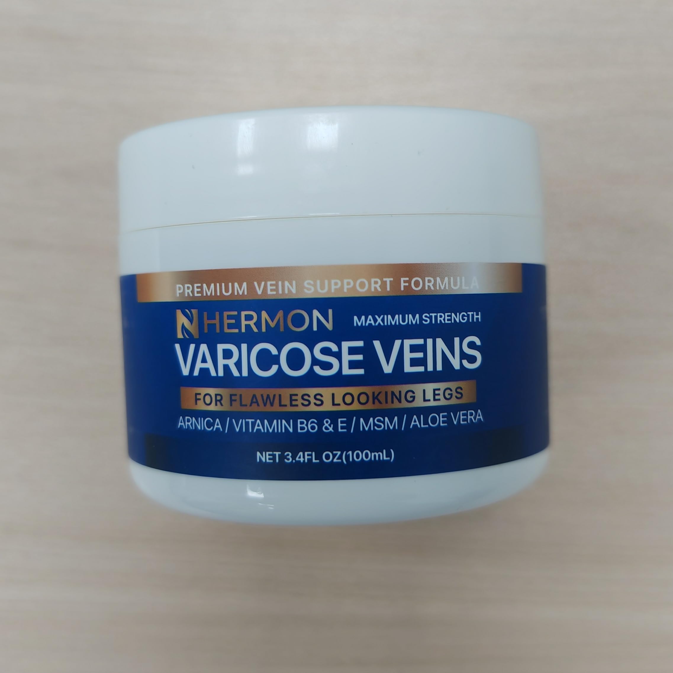 Hermon closeup creamy texture highlighting non-greasy feel.