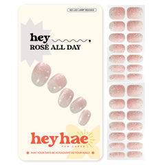 Heyhae semi-cured gel nail strips in rose champagne glitter for quick salon-quality manicures.