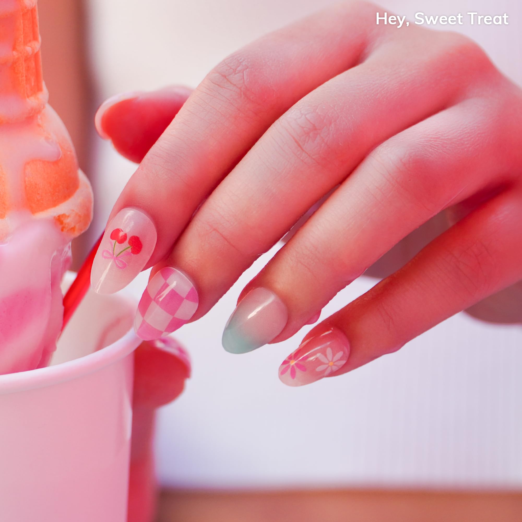 Heyhae Sweet Treat nails closeup shows glossy ombre look for stylish nails.
