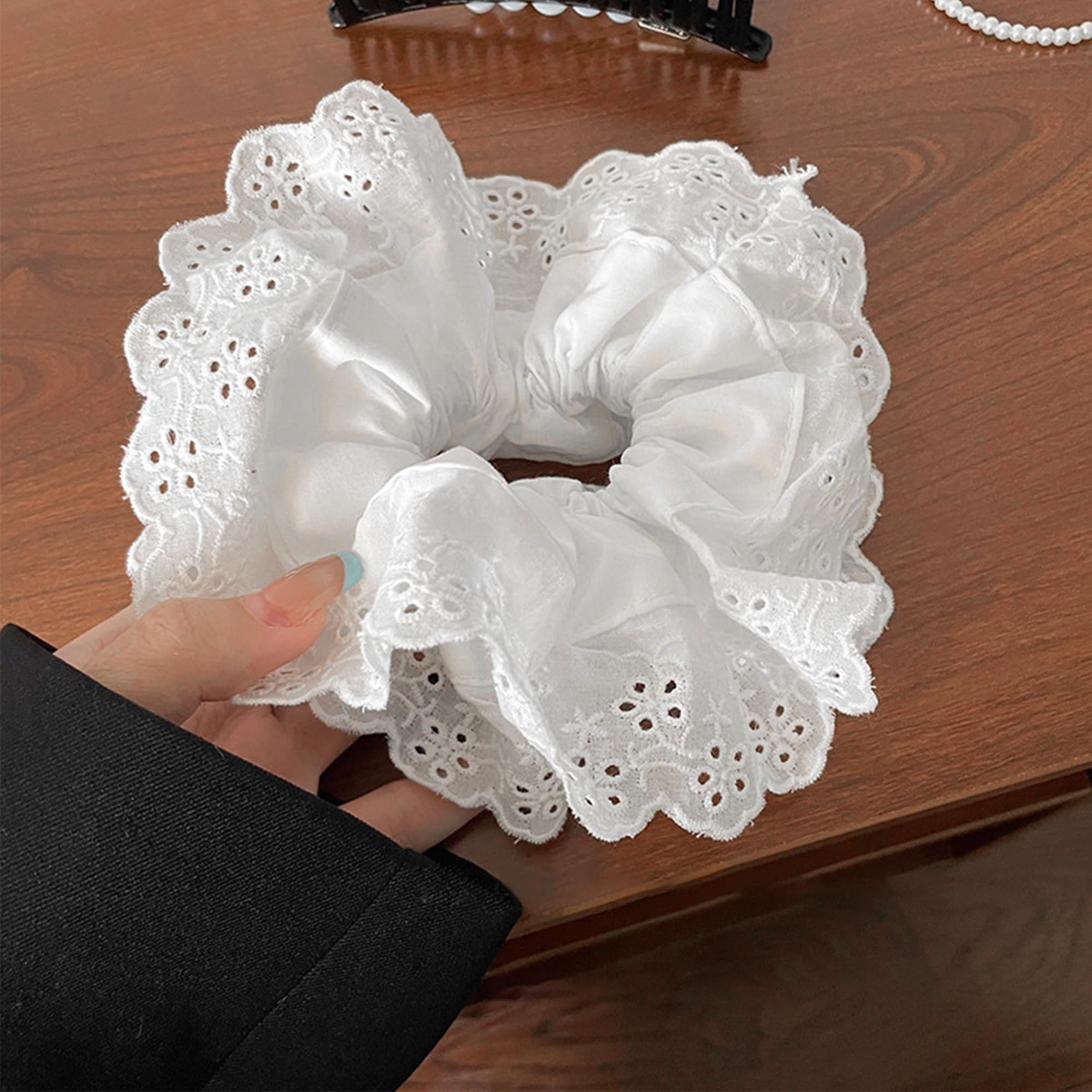 Heyiminy white scrunchie elastic band highlights easy removal and lasting elasticity.