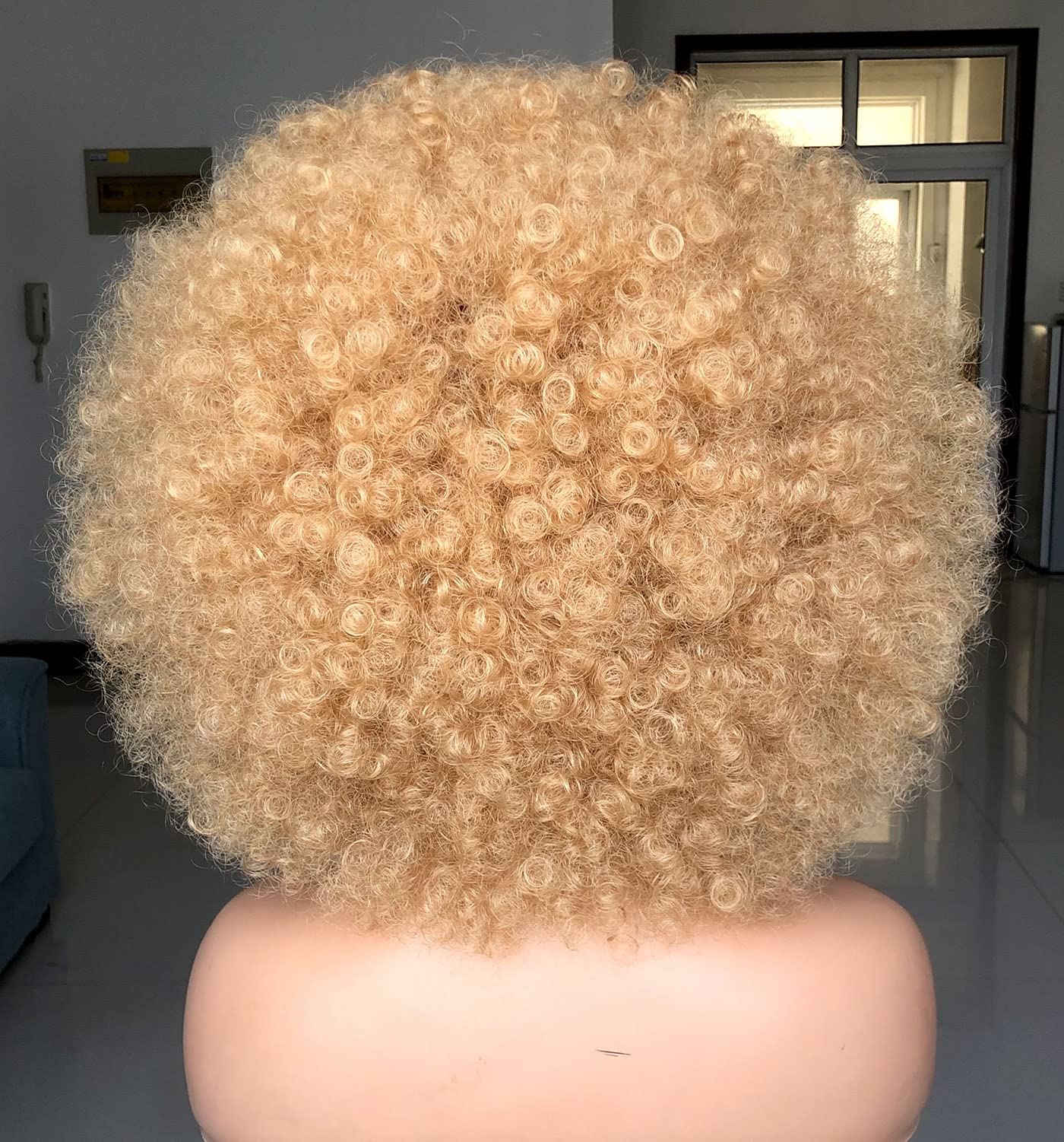 HIHOO afro wig with 10-inch silhouette delivers dramatic volume.