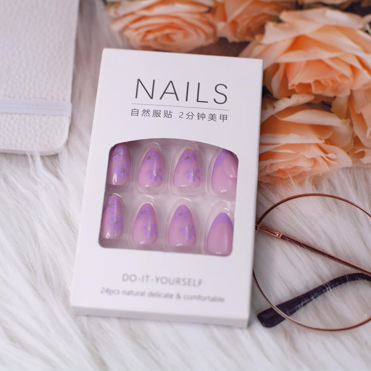 HJKDSFD hands wearing nails shows wear-at-home manicure for quick glam.
