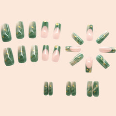 Hkanlre green marble design nails closeup showing intricate pattern for chic daily wear.