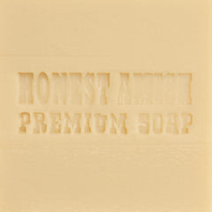 Honest Amish Lavender and Clove Soap Bar held in hand conveys gentle cleansing and ritual use.