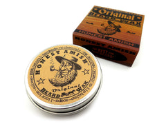 Honest Amish Original Beard Wax applying for controlled styling and tame hairs.