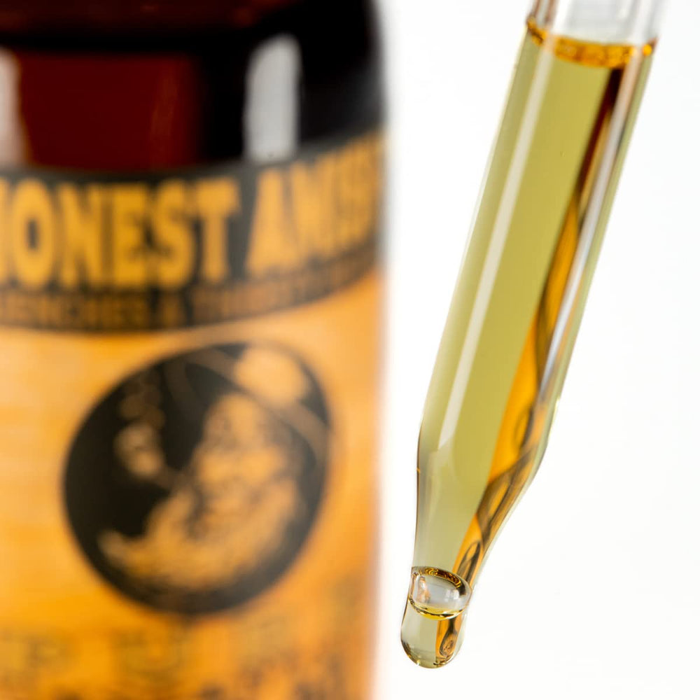 Honest Amish Pure Beard Oil ingredients closeup, all-natural organic formulation.